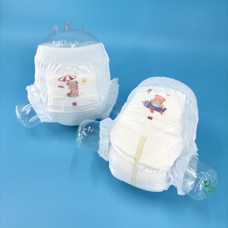 China Nuevo diseño precio al por mayor pañales desechables para bebés pantalones de entrenamiento para bebés Fabricantes de pañales